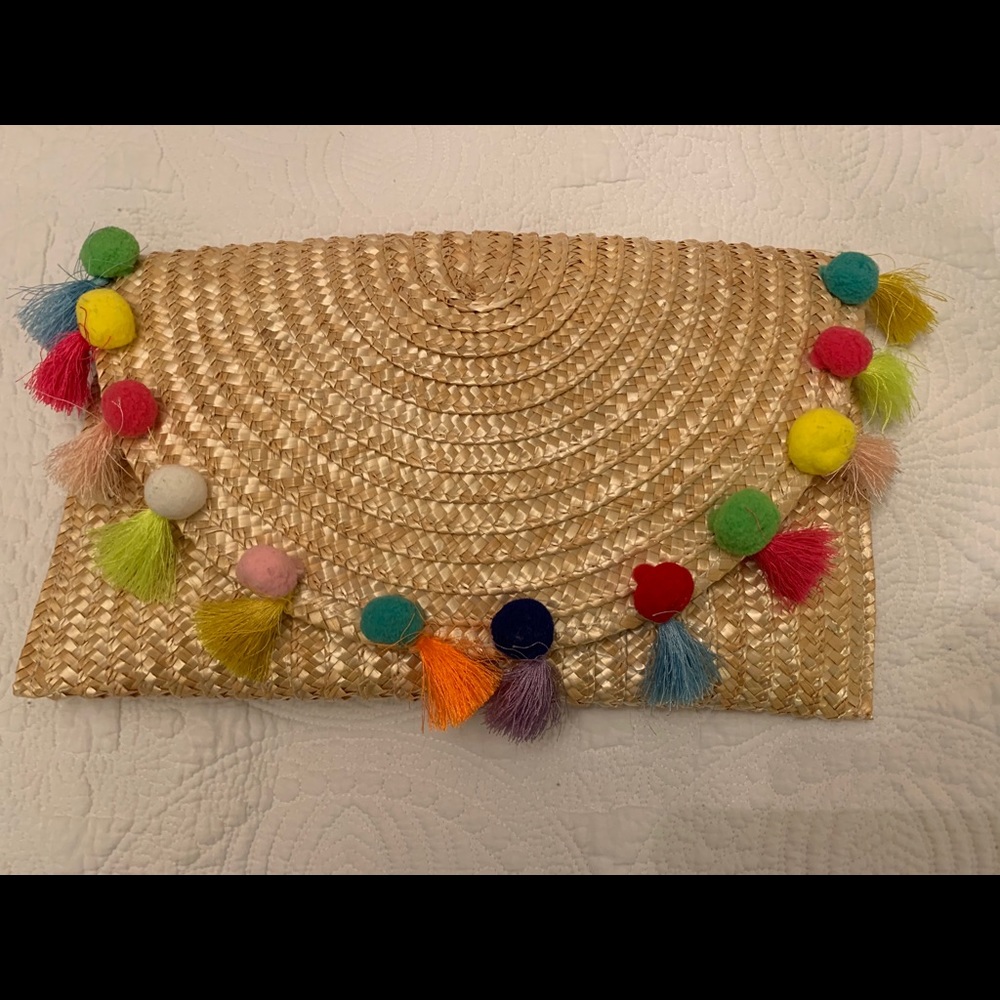EUC Tiff and Jen Pom Pom rattan clutch